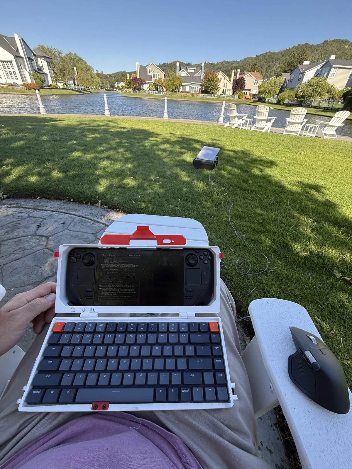 Steam Deck and keyboard used outdoors with a Starlink connection.