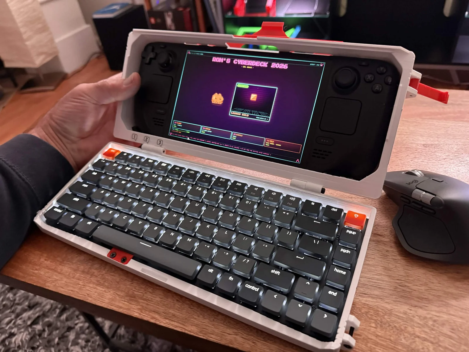 Ron's white and red Steam Deck cyberdeck with an integrated keyboard